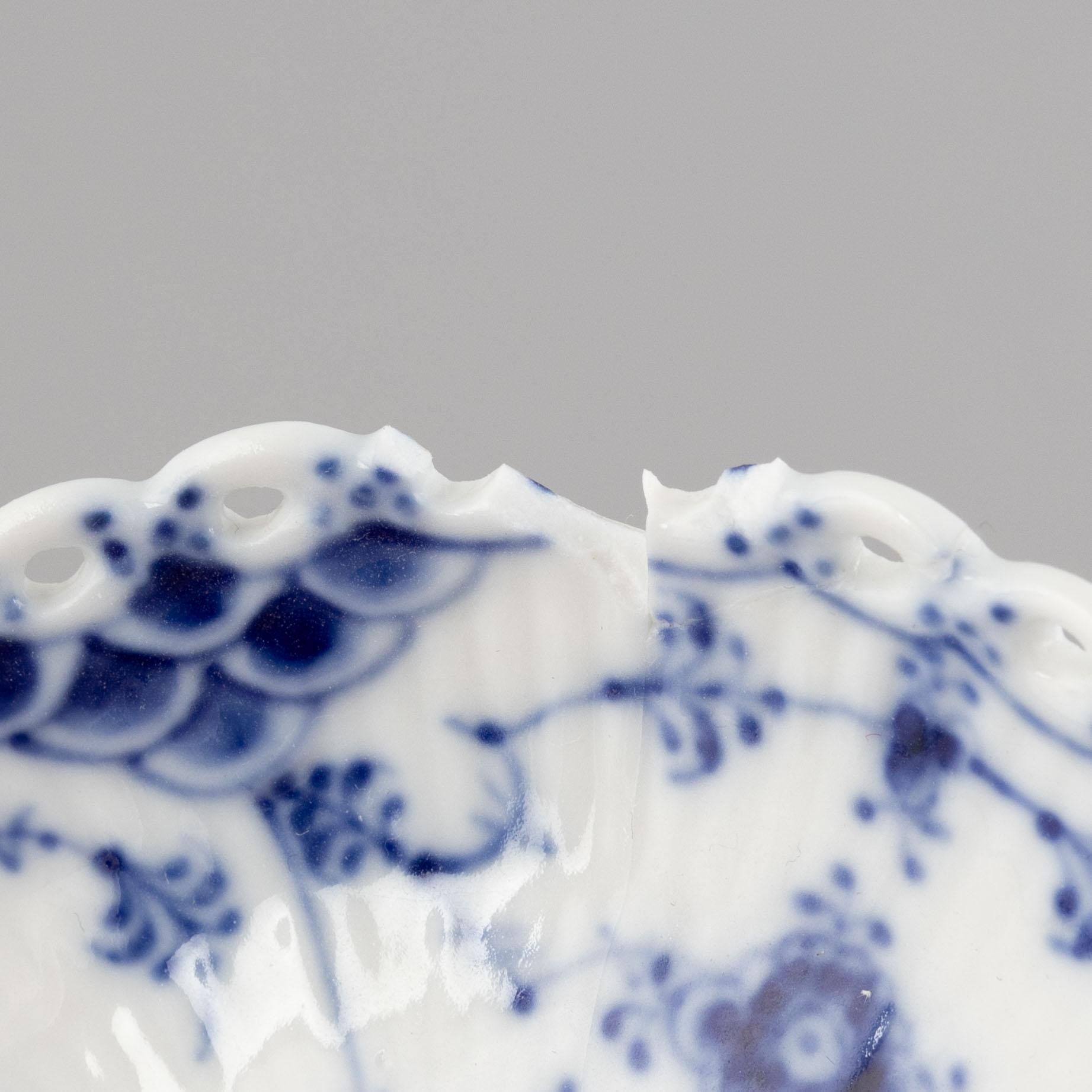 A pair of 'Blue Fluted Full Lace' porcelain Candle sticks, Royal Copenhagen, model number 1008, post 1923.