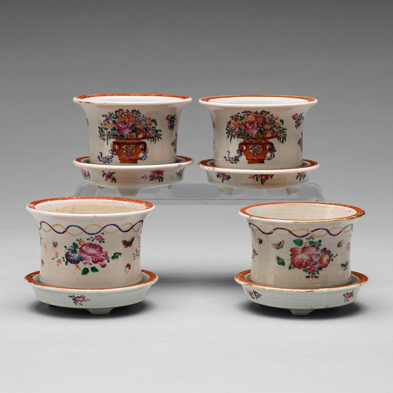 A set of four (2+2) famille rose flower pots with stands, Qing dynasty, Qianlong (1736-95).