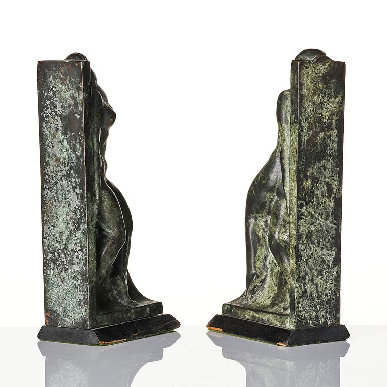 Axel Gute, a pair of Swedish Grace patinated bronze bookends, 1920s.