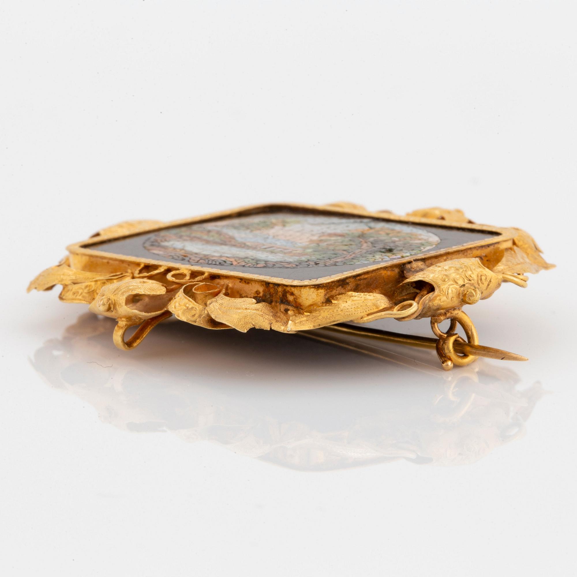 An 18K gold and micro mosaic brooch.