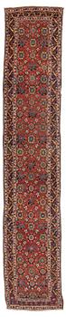 370. An antique Kurdish runner, Northwest Persia (Iran), c. 560 x 102 cm.