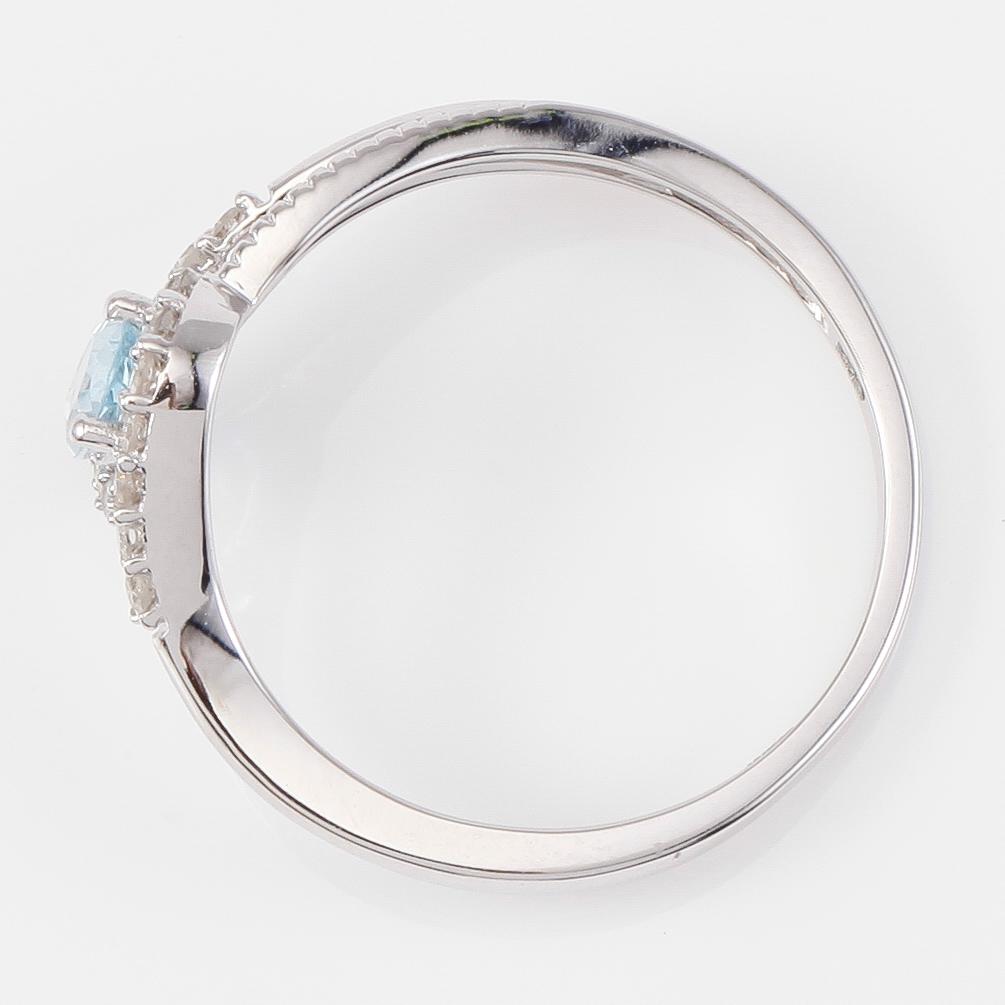 RING, 14K vitguld, diamanter tot ca 0.17 ct. och akvamarin tot ca 0.50 ct.