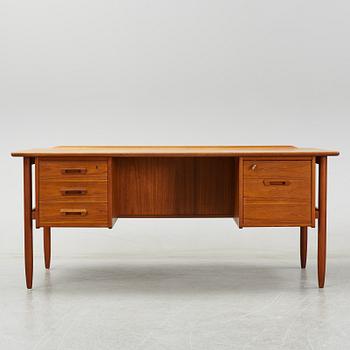 A 1950/60's teak writing desk.