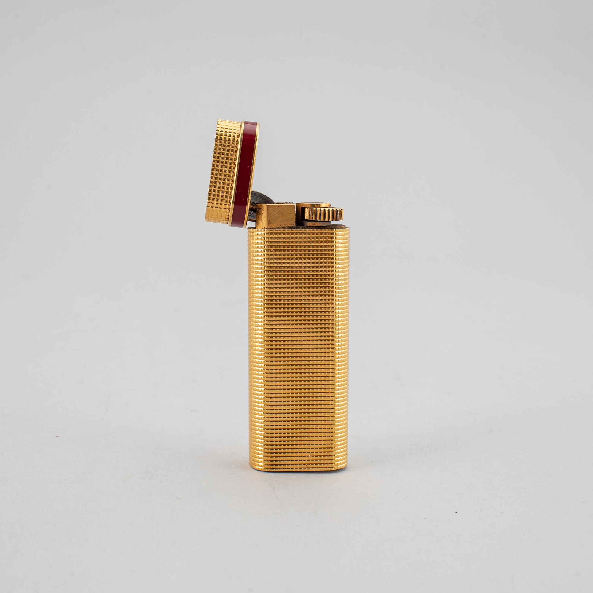A Cartier lighter and pen.