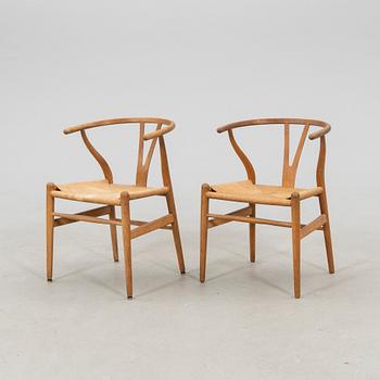 Hans J. Wegner, chairs, a pair, "The Y-Chair", model CH-24, Carl Hansen & Søn, Denmark.