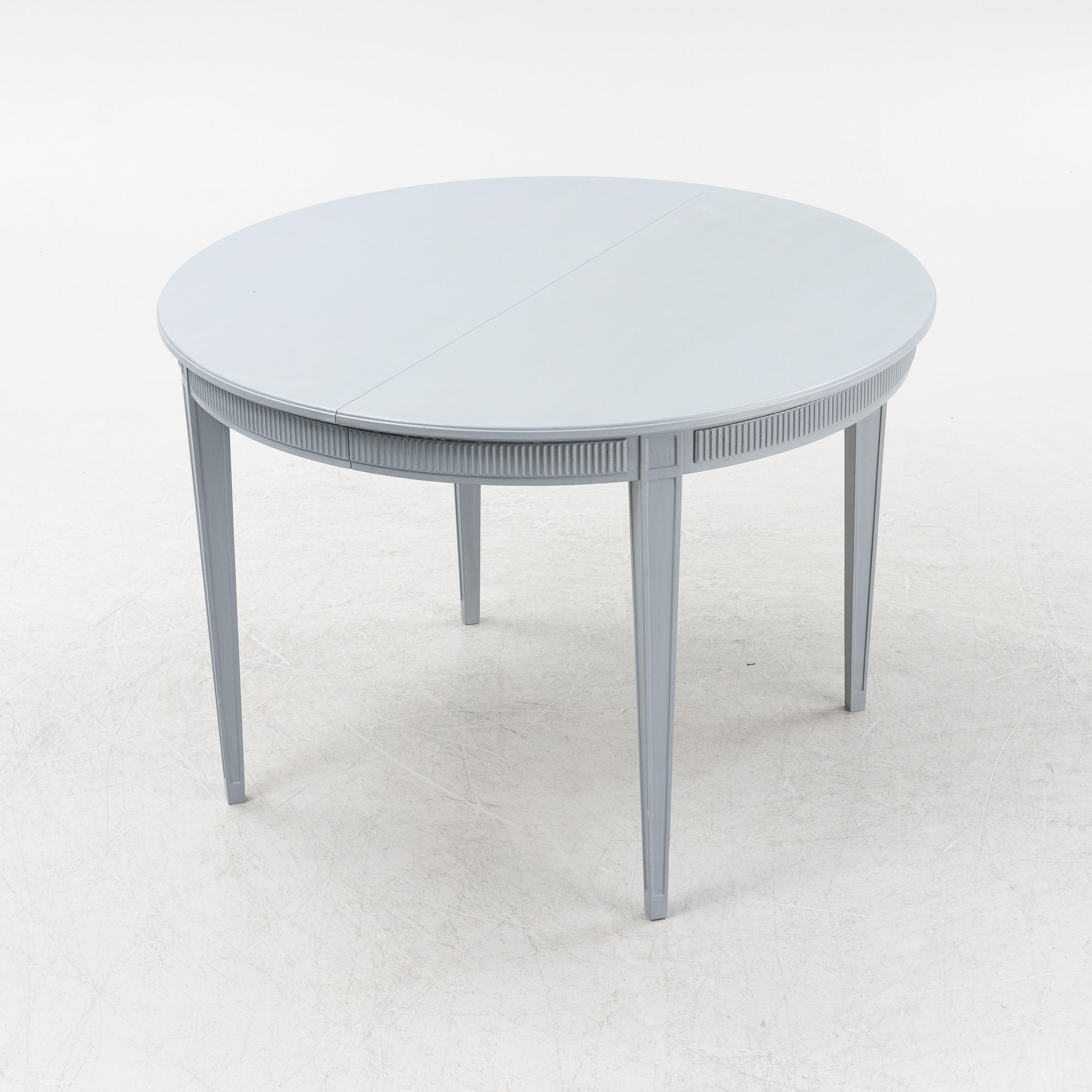 A gustavian style painted dining table, second half of the 20th century.