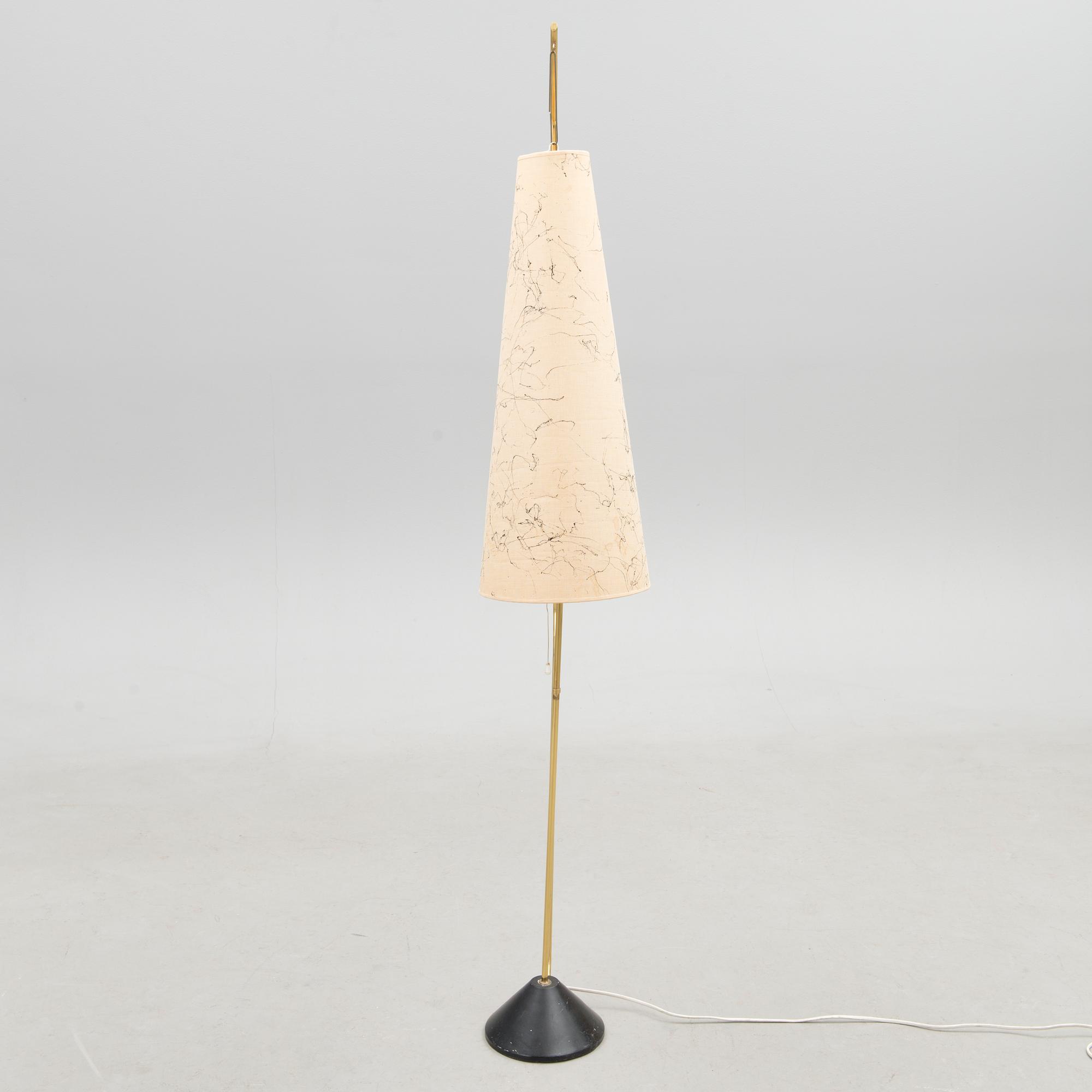 A mid-20th Century floor lamp.