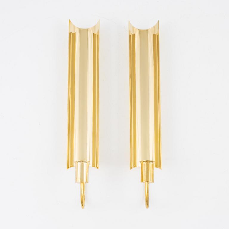 Pierre Forssell, a pair of 'Reflex' brass wall sconses, Skultuna.