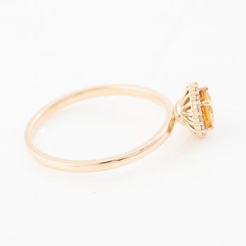 Ring 14K rose gold with orange sapphire and brilliant-cut diamonds.