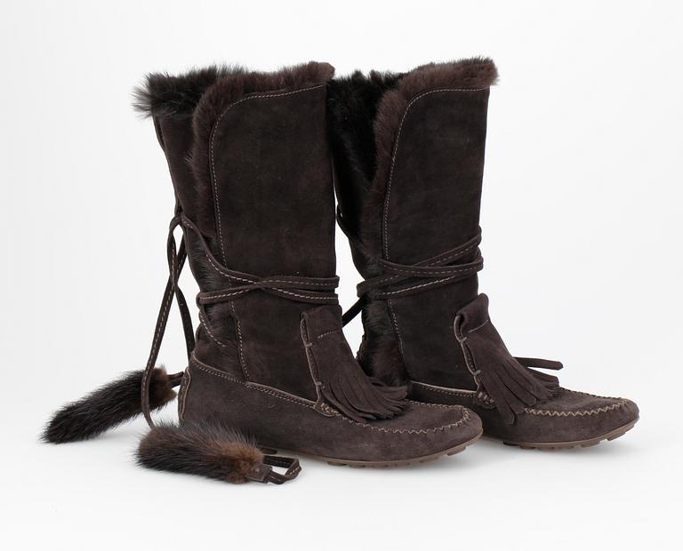 A pair of boots by Yves Saint Laurent.
