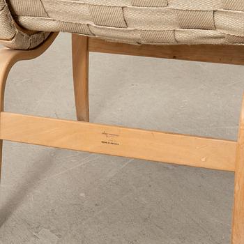 Bruno Mathsson, a pair of "Eva" armchairs, Bruno Mathsson Company, Värnamo, late 20th century.