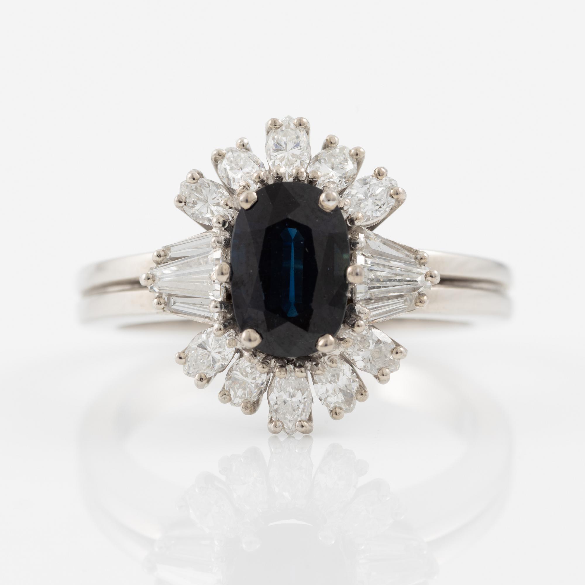 Ring, 18K white gold with sapphire and trapeze- and navette-cut diamonds.
