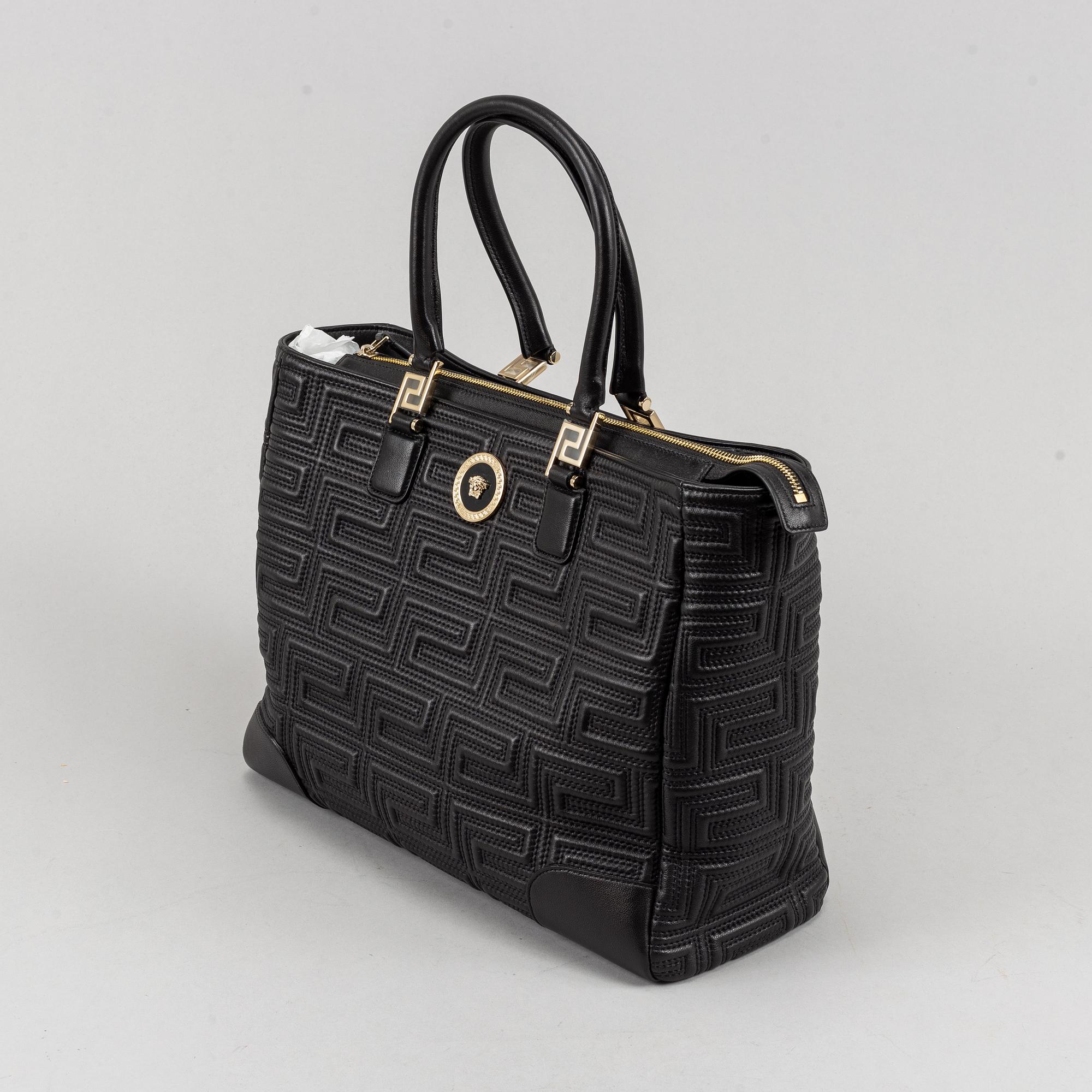 Versace, a black quilted leather handbag.
