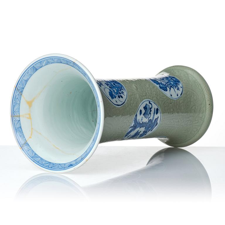 A Chinese blue and white celadon-ground beaker vase, Qing dynasty, Kangxi (1662-1722).