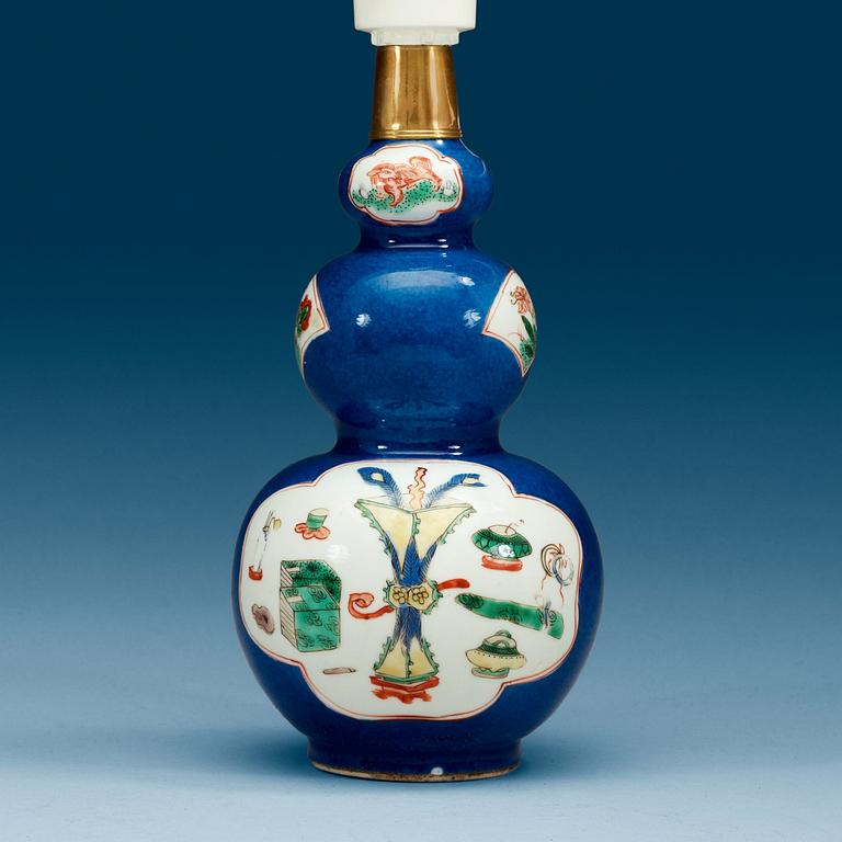 A powder blue and famille verte kalebas vase, Qing dynasty 18th Century.
