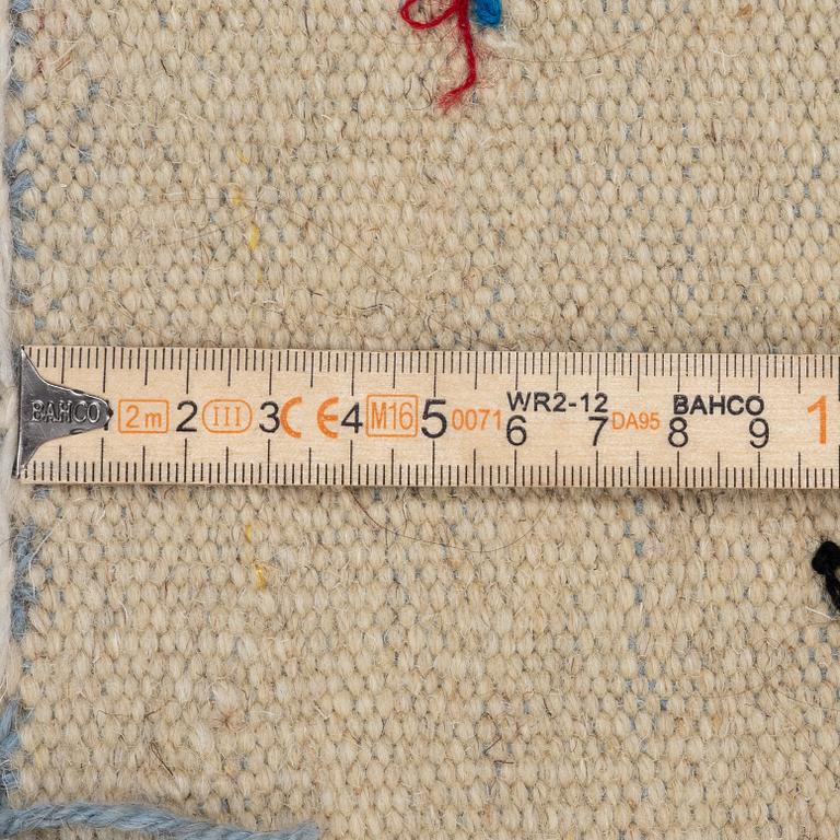A hand-embroidered kilim carpet, c. 195 x 148 cm.