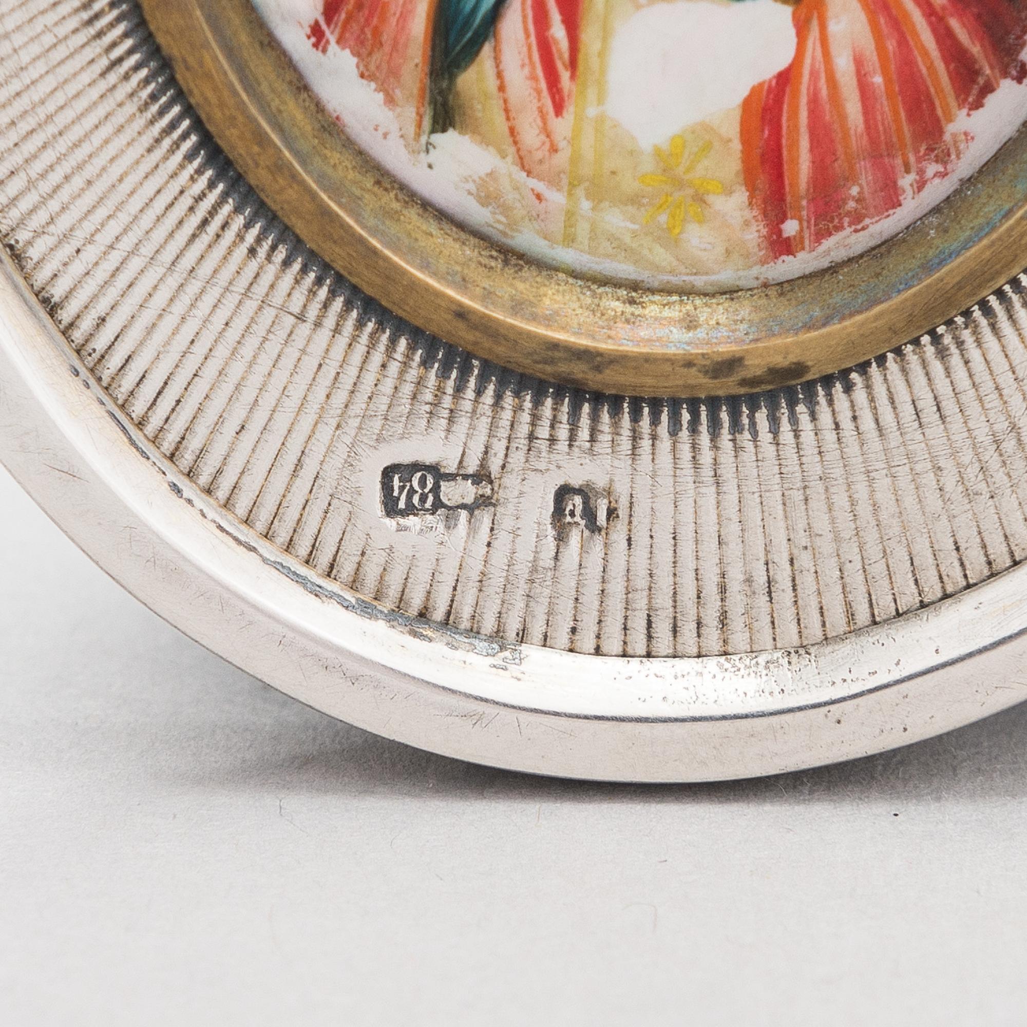 A silver and mother-of-pearl icon, Russian import mark, Moscow 1908-17.