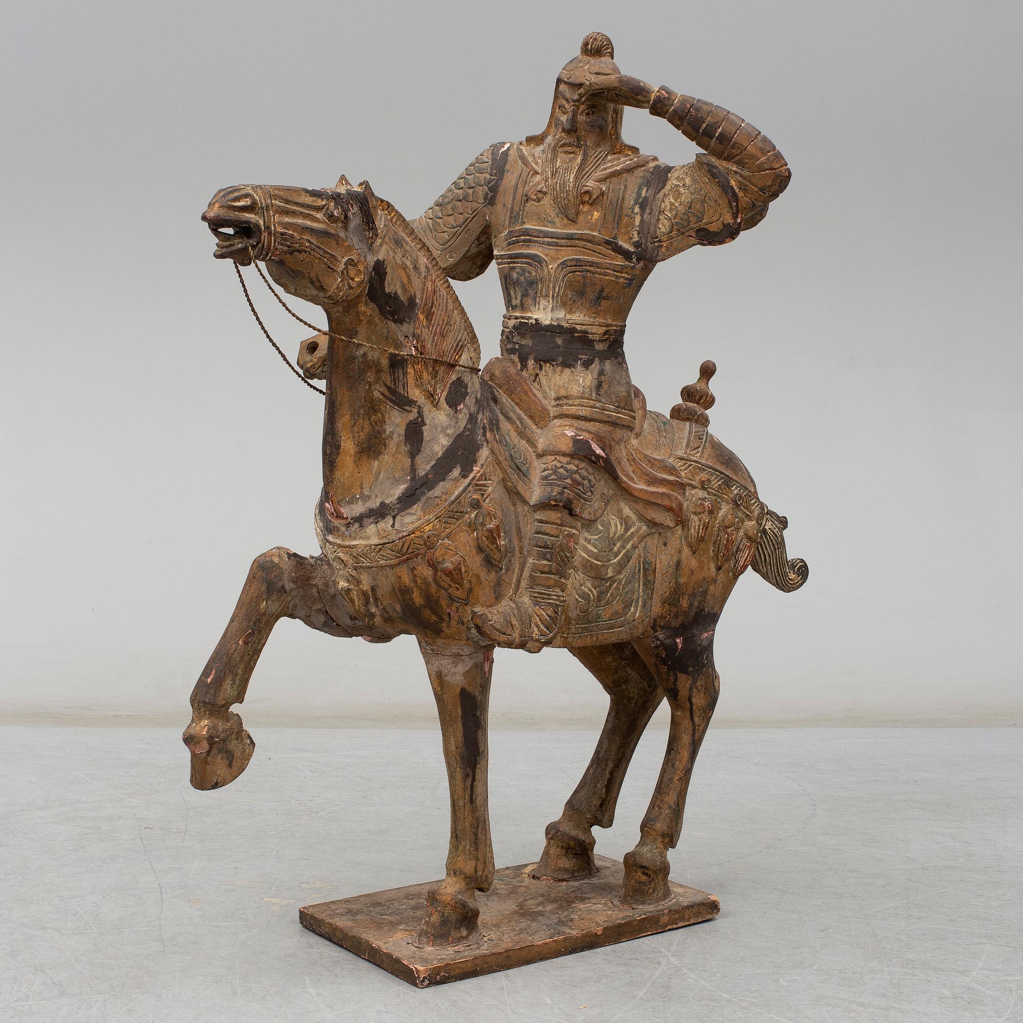 A large modern Chinese wooden sculpture.