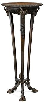 1029. A 19th century bronze tripod.