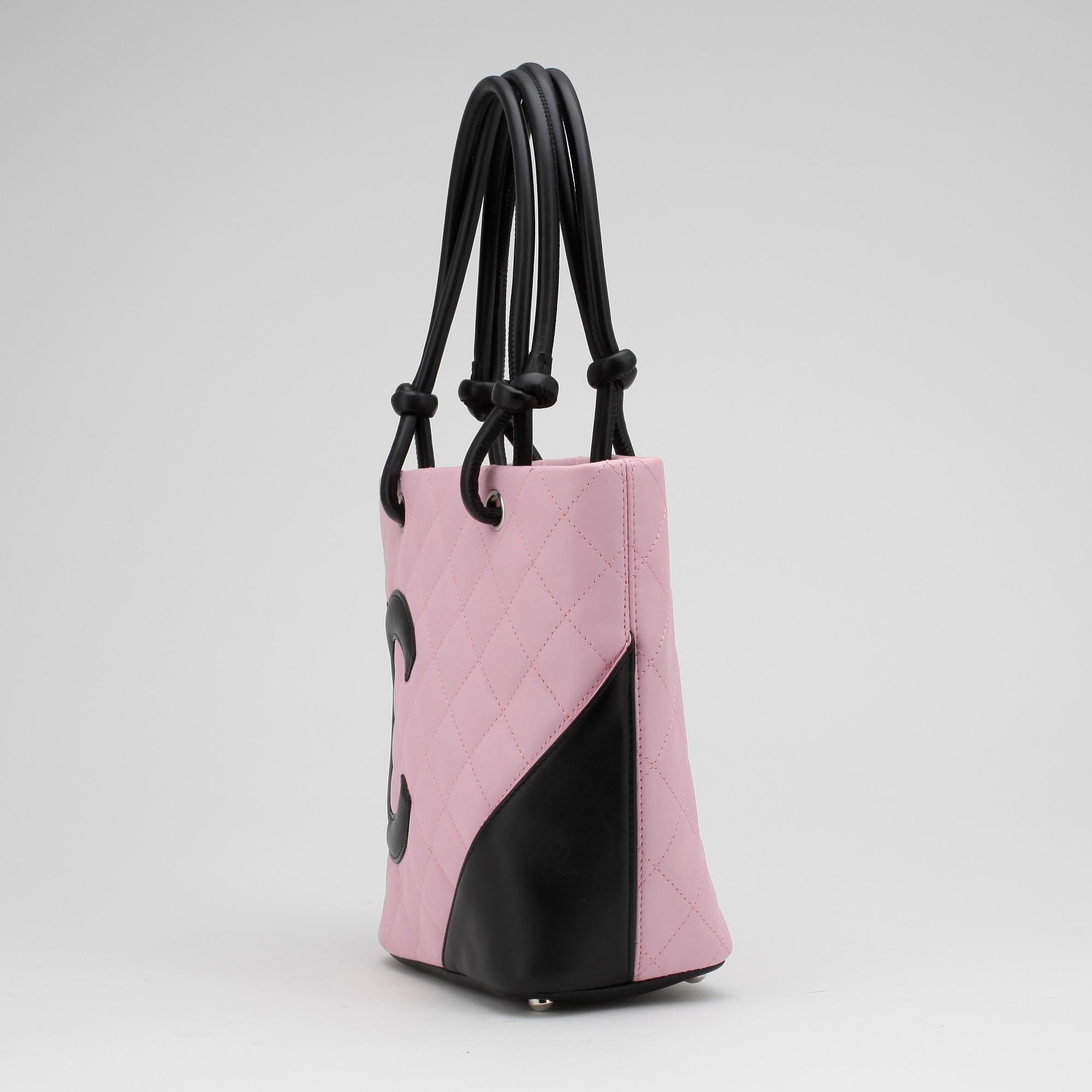 CHANEL, a pink leather "Small Shopping" handbag.