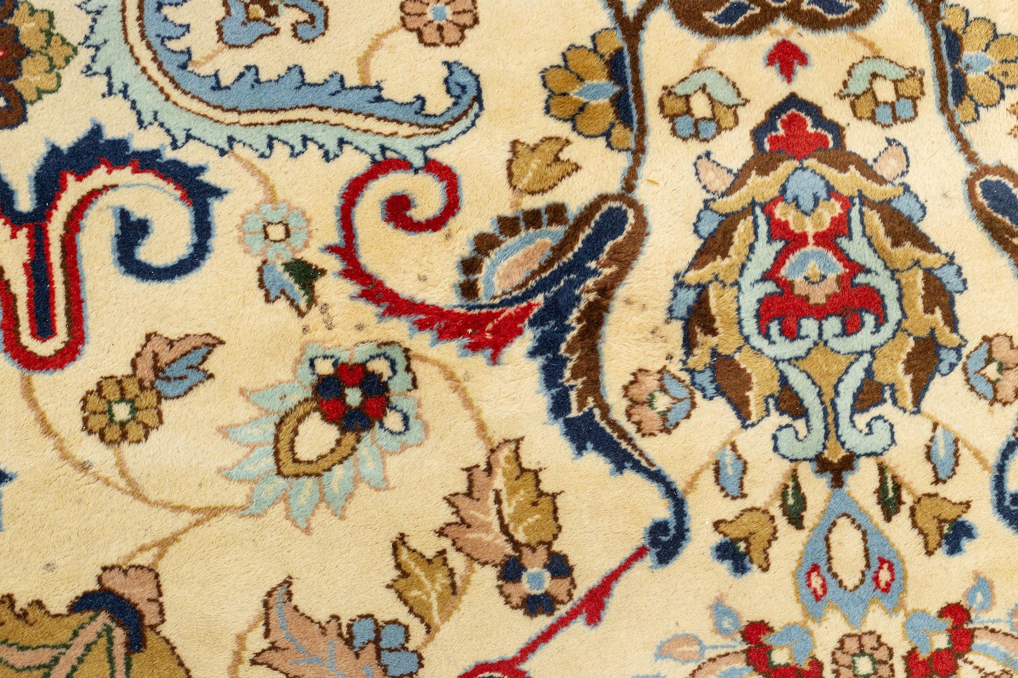 A carpet, signed, circa 286 x 212 cm.