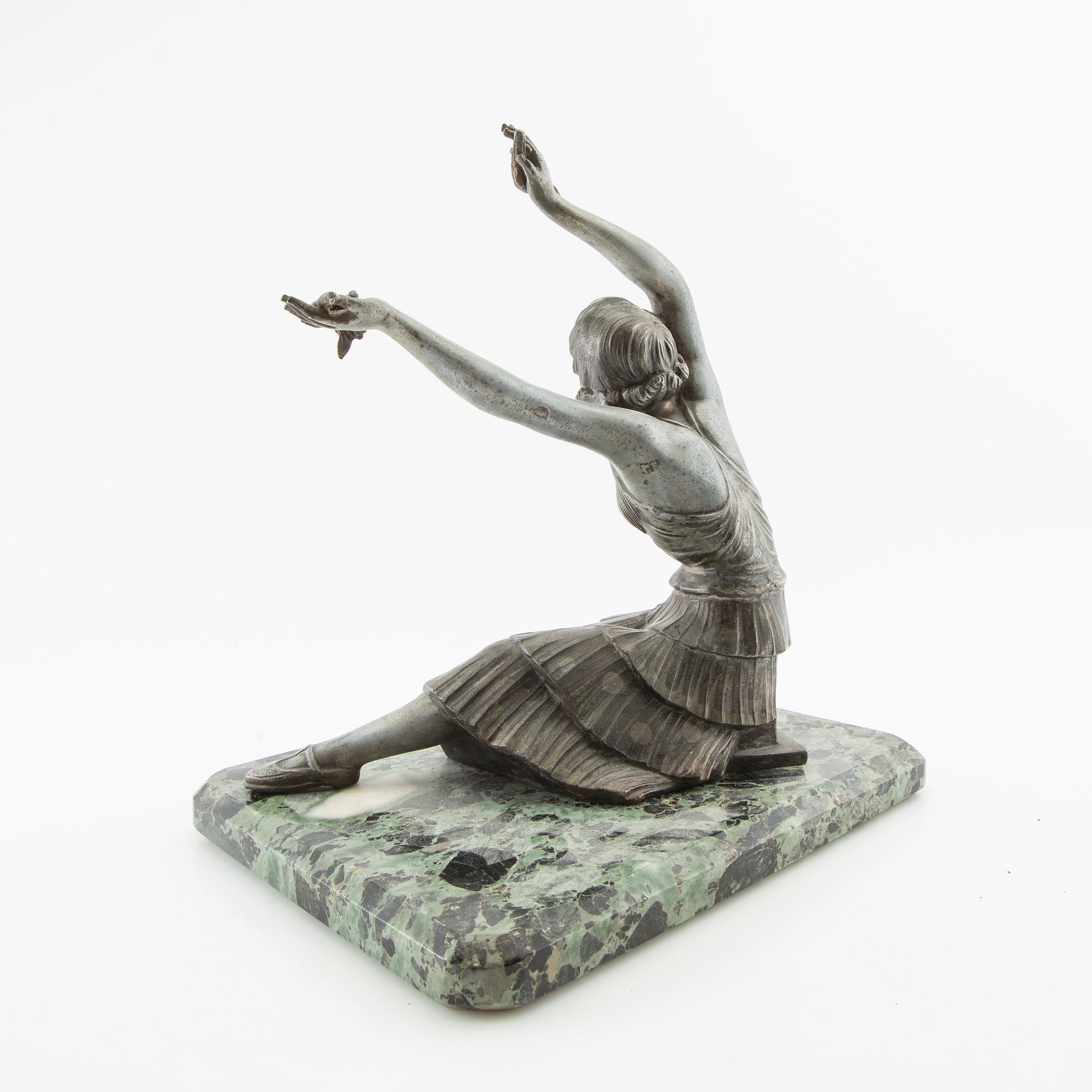 Decorative sculpture Sitting woman first half of the 20th century.