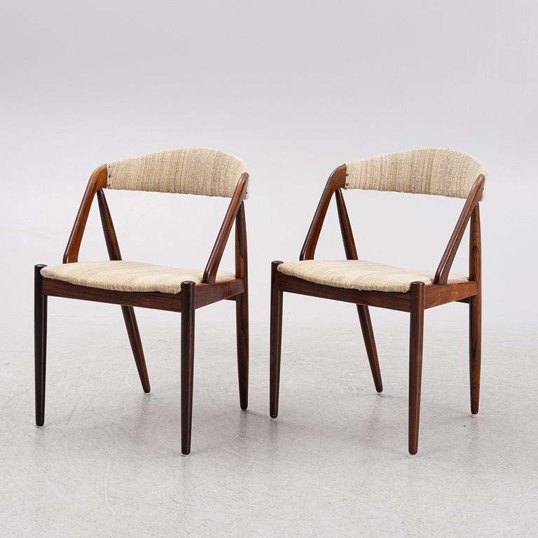 Kai Kristiansen, a set of four 'Pige' chairs and a dining table, Denmark, 1960's.