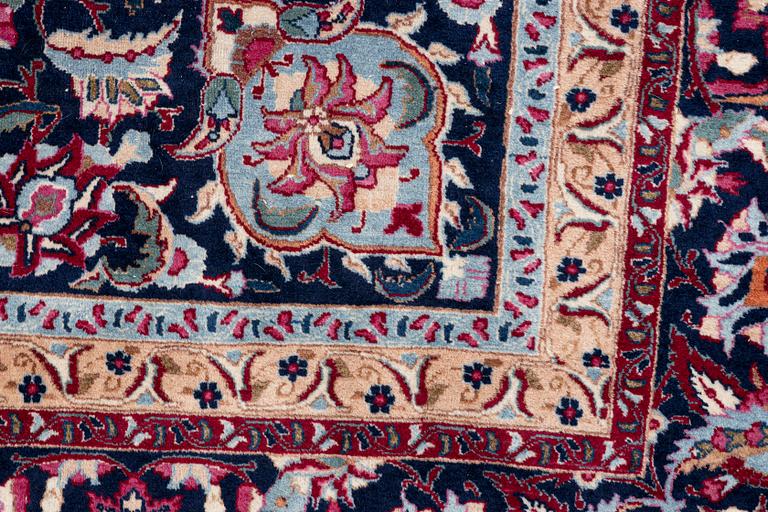A oriental carpet, c. 375 x 290 cm.