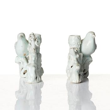 A pair of blanc de chine candle/joss stick holders, Qing dynasty.