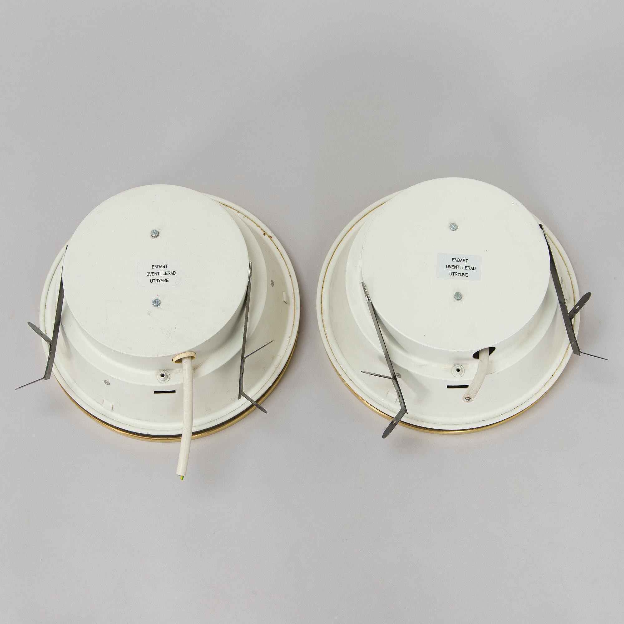 Arne Jacobsen, A pair of 'Munkegaard' ceiling lights for Louis Poulsen, Denmark.