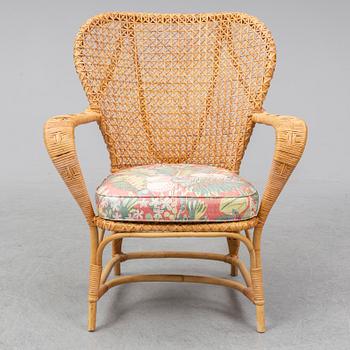 a mid rattan chair by Korgmakare Larsson, Stockholm, mid 20th century.