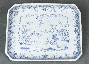 A Swedish Rörstrand faience tea table dated 1745.