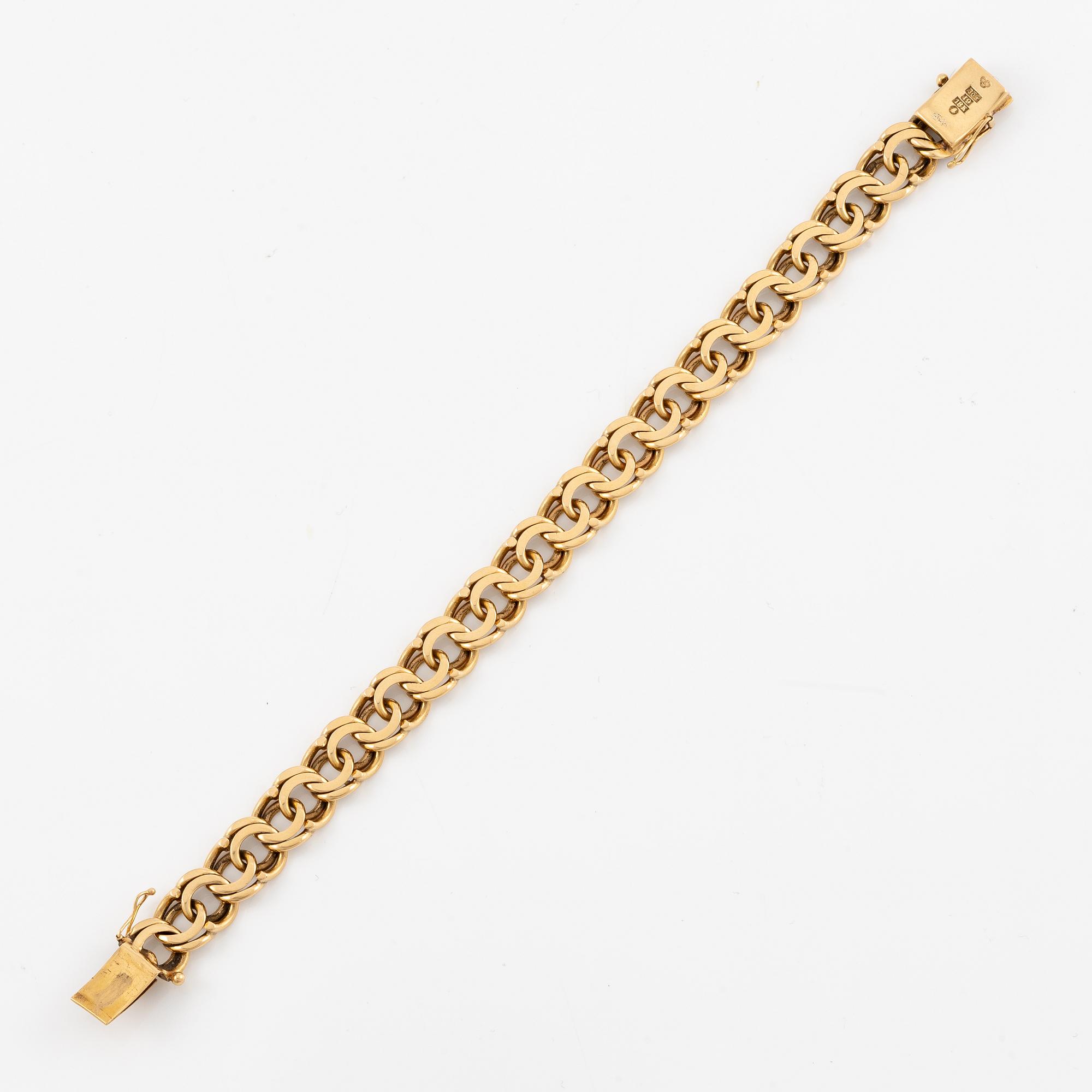 Arm bracelet, 18K gold, bismarck link.