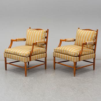 a pair of armchairs from the second half of the 20th century.