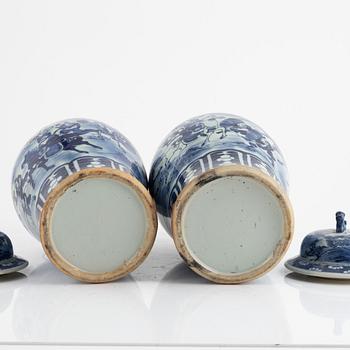 A pair of blue and white urns with covers, China, 19th century.
