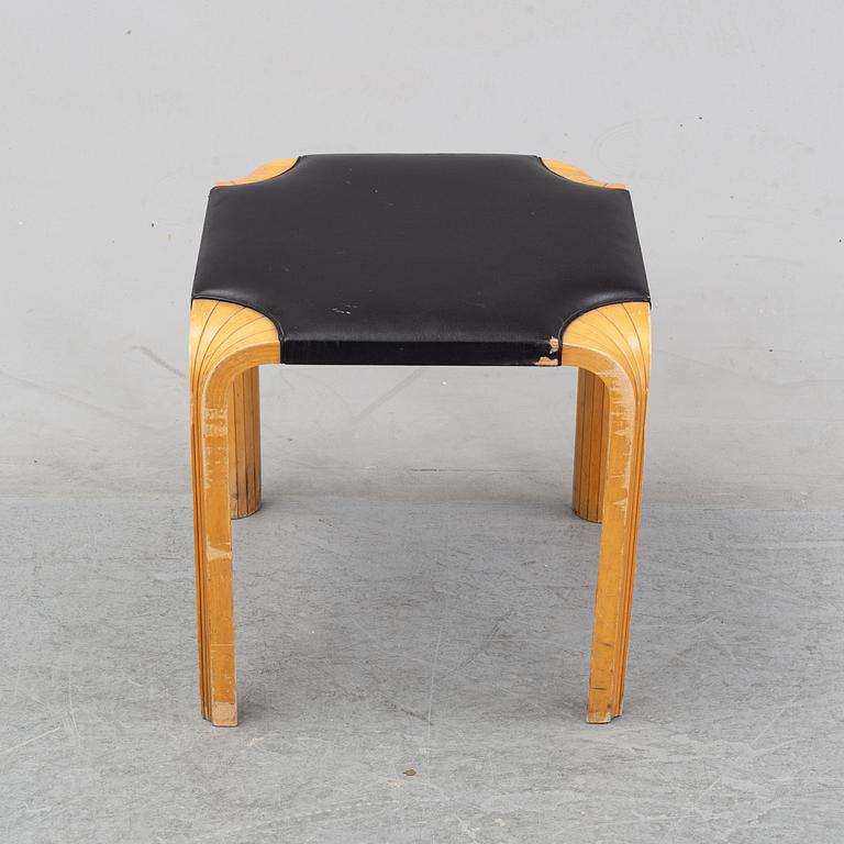 Alvar Aalto, a birch and leather stool, Artek, second half of the 20th century.