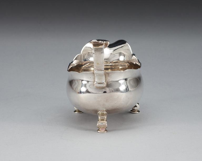 A Swedish 18th century silver cream-jug, makers mark of Jonas Thomasson Ronander, Stockholm 1774.