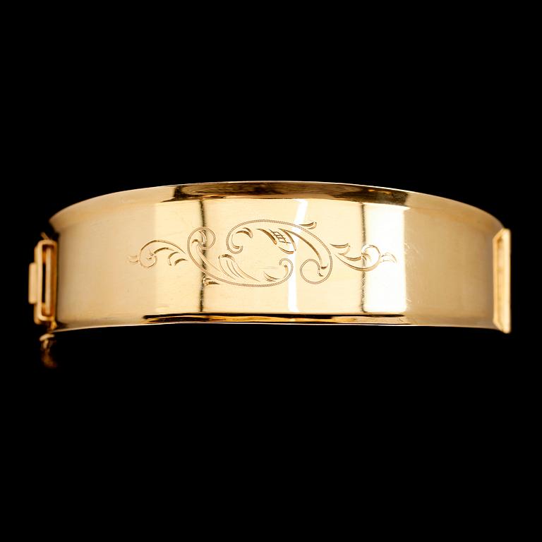 ARMBAND, 18 k guld, stel modell, total vikt ca 21 g.