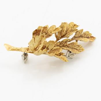 Brosch i form av ett löv 18K guld.