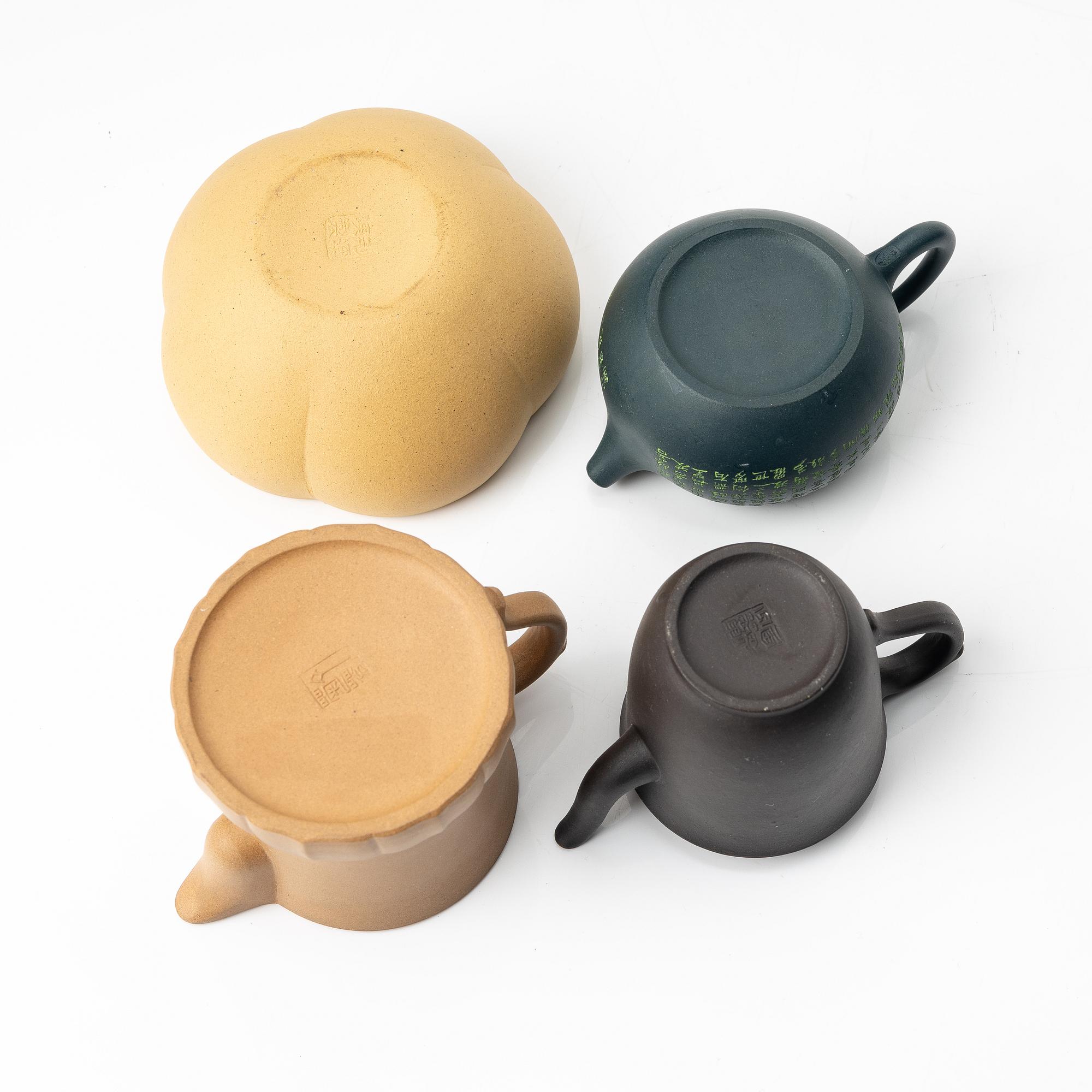 A group of three yixing teapots and a box with cover, China, 1970/80s.