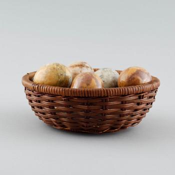 13 stone eggs from the late 20th century.