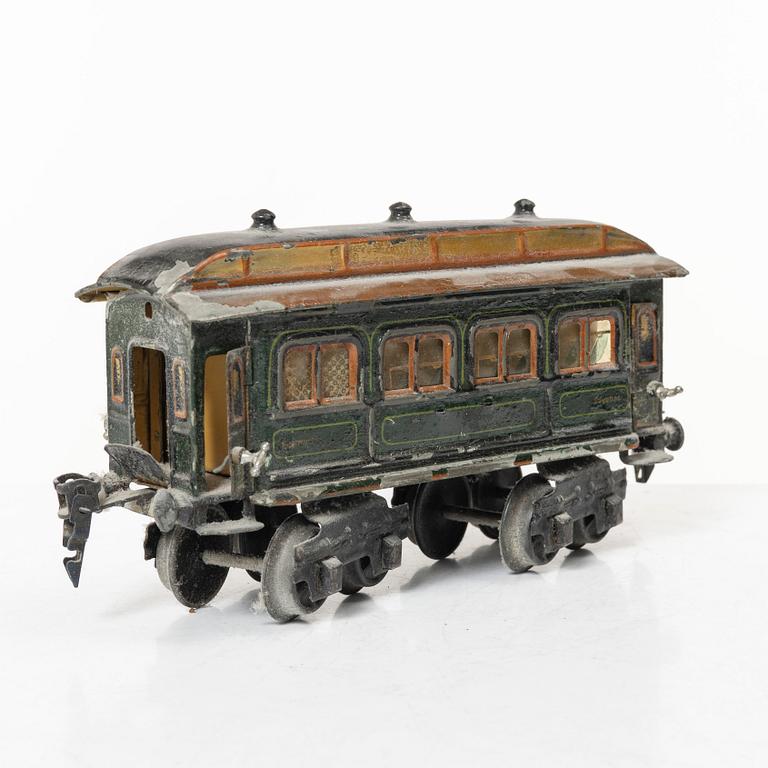 Model train with track and station building, 13 pieces, Germany, 1920s.