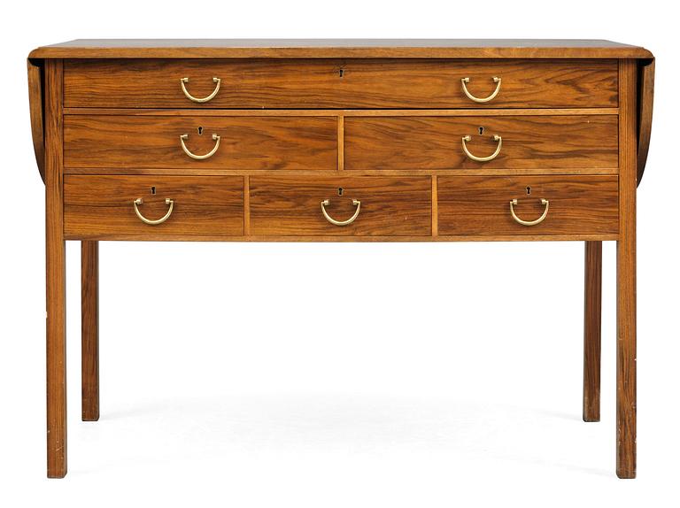 A Josef Frank walnut sideboard with a burr wood top by Firma Svenskt Tenn.