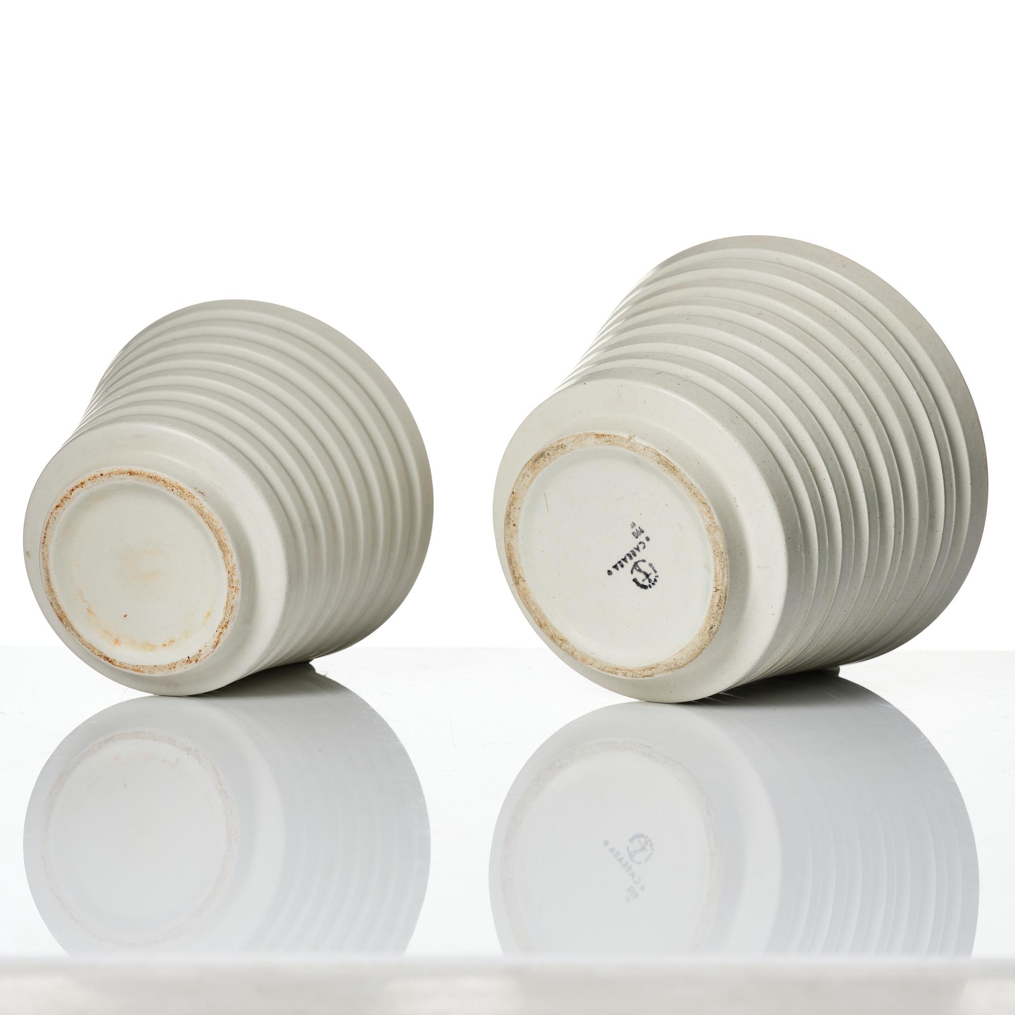 Wilhelm Kåge, A set of three ceramic flower pots, a vase and jar with lid,  Gustavsberg 1930s.