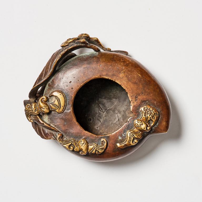 A Chinese peach shaped bronze brush washer, late Qing dynasty.