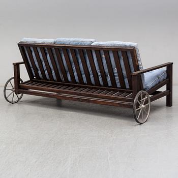 ELSA STACKELBERG, a garden sofa from the second half of the 20th century.