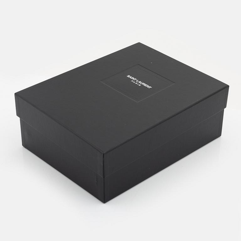 Yves Saint Laurent, a pair of black leather and studs boots, size 38.