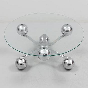 A 1960s / 70s coffee table with glass top.