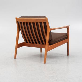 Folke Ohlsson, an 'USA 75' armchair, Dux, Sweden, 1960's.