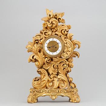 A rococo style table clock, 19th Century.